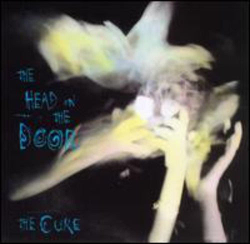 the album cover for The Cure - Head On The Door (Uk)