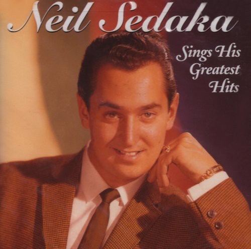 the album cover for Neil Sedaka - Sings His Greatest Hits