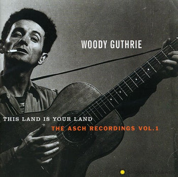 the album cover for Woody Guthrie - This Land Is Your Land 1