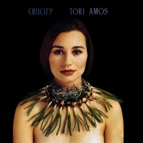 the album cover for Tori Amos - Crucify