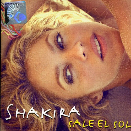 the album cover for Shakira - Sale El Sol [Import]