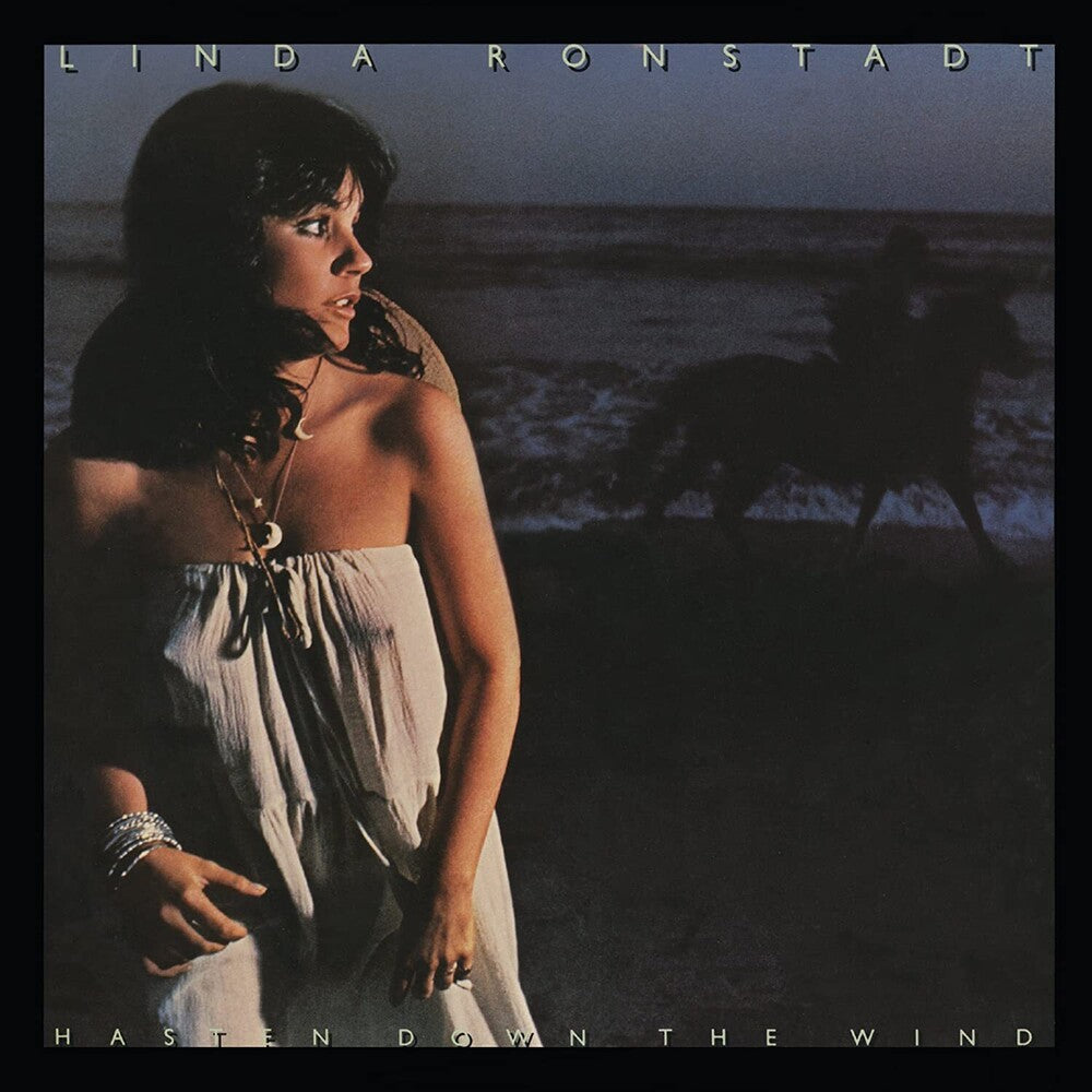 the album cover for Linda Ronstadt - Hasten Down the Wind