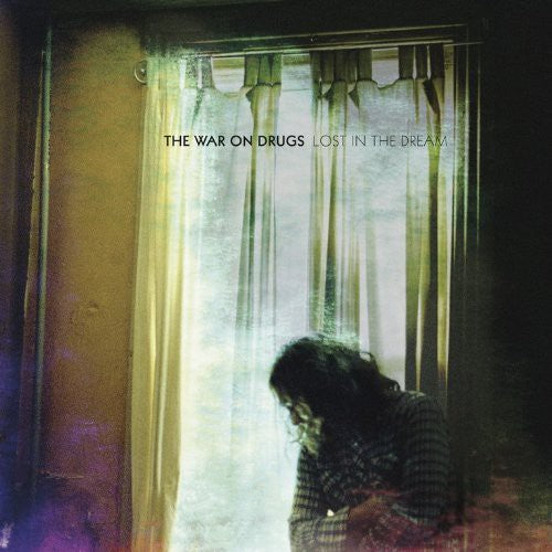 the album cover for The War On Drugs - Lost In The Dream [Limited Edition]