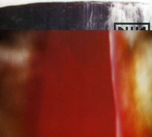 the album cover for Nine Inch Nails - The Fragile