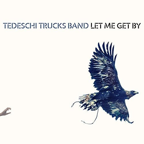 the album cover for Tedeschi Trucks Band - Let Me Get By