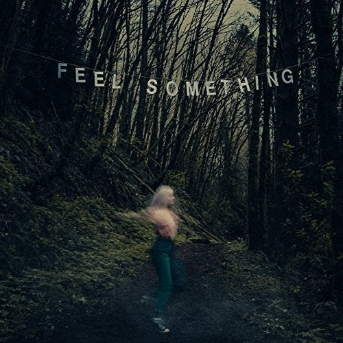 the album cover for Movements - Feel Something