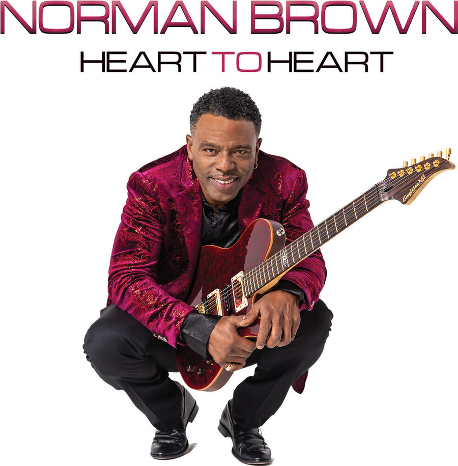 the album cover for Norman Brown - Heart To Heart