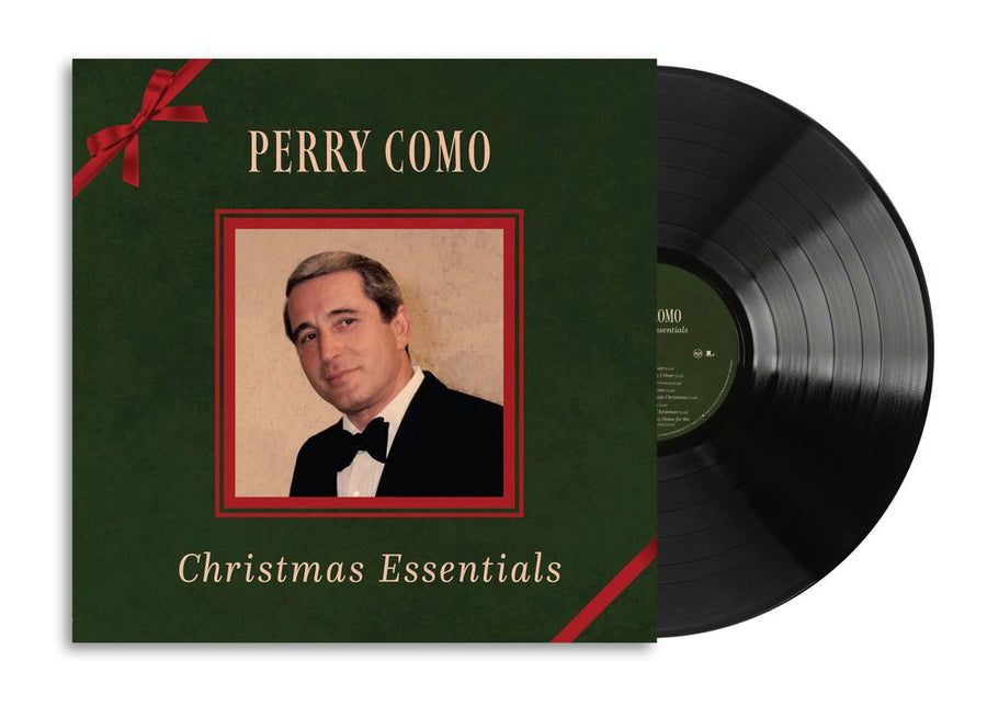 the album cover for Perry Como - Christmas Essentials