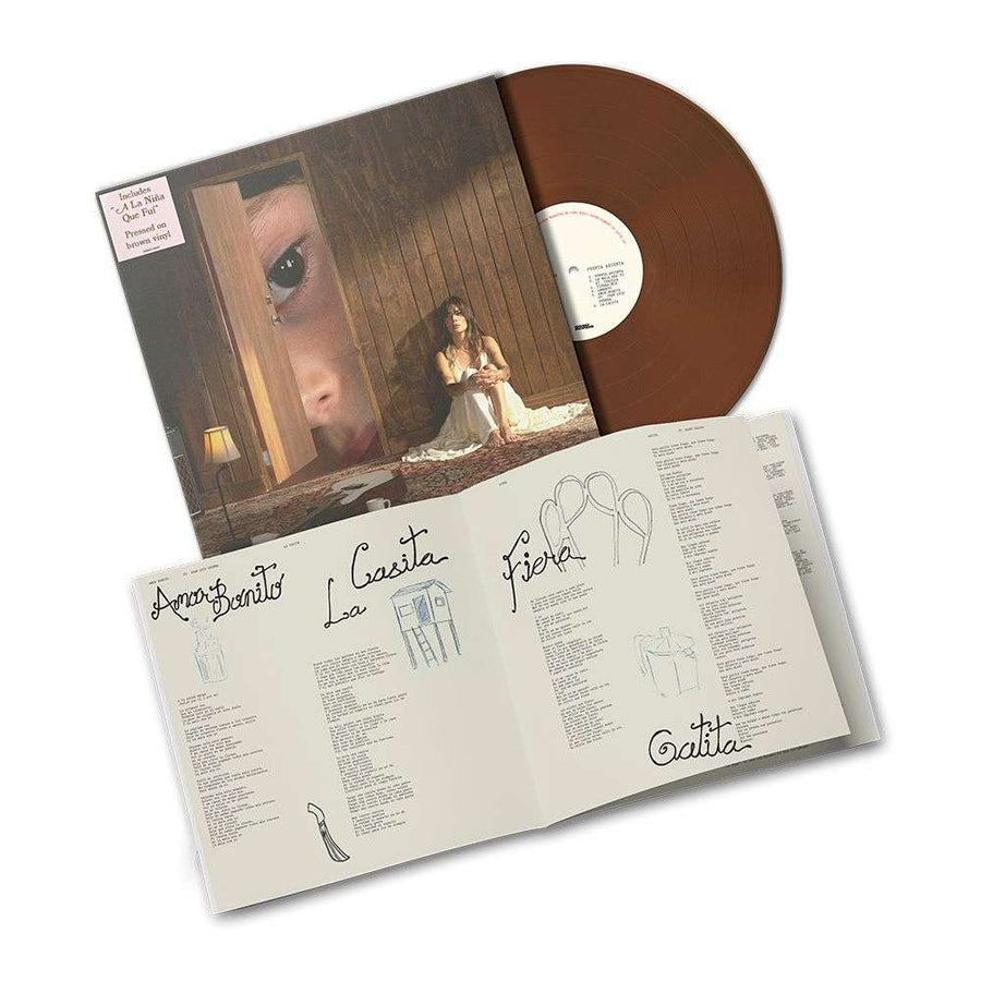 the album cover for Kany Garcia - Puerta Abierta [Brown]