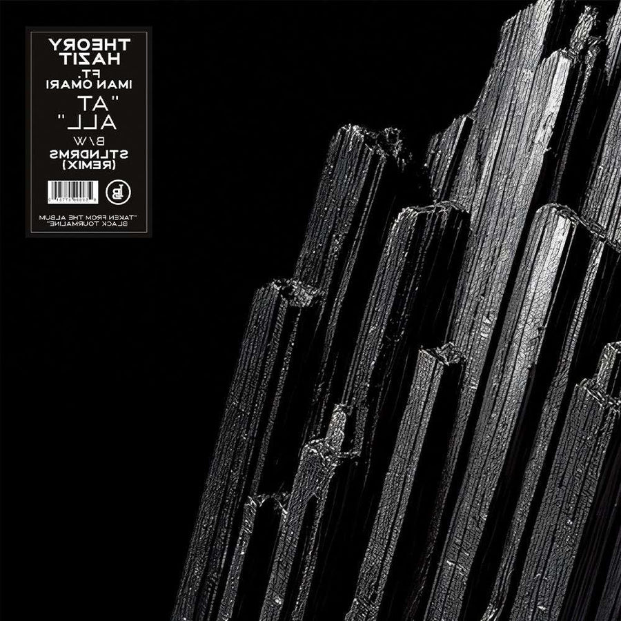 the album cover for Theory Hazit - At All ft. Iman Omari b/w At All (STLNDRMS Remix)