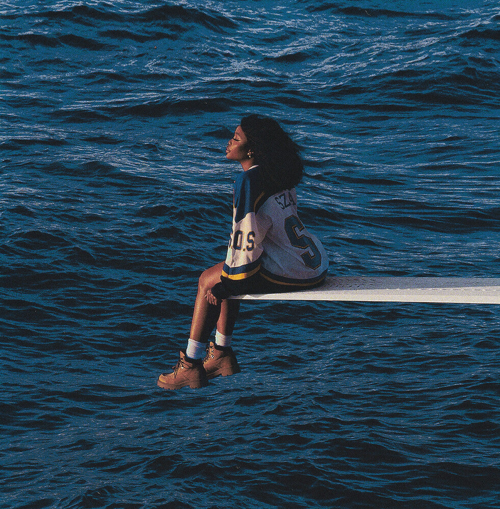the album cover for SZA - SOS