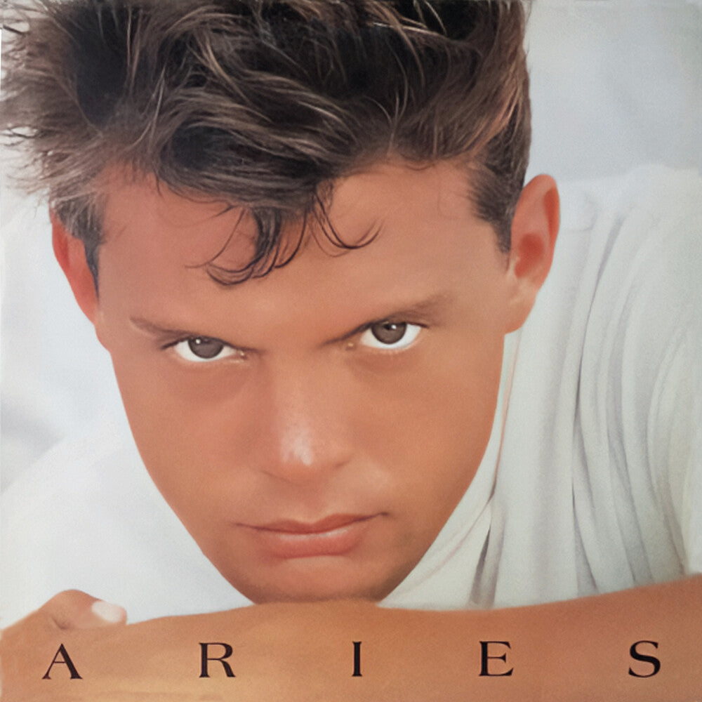 the album cover for Luis Miguel - Aries (Arg)
