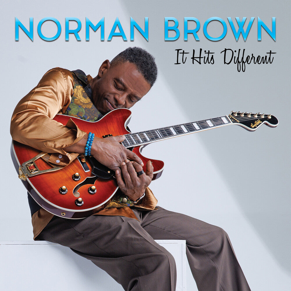 the album cover for Norman Brown - It Hits Different