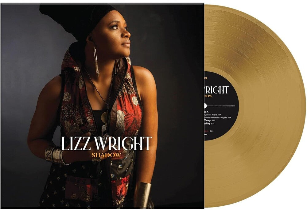 the album cover for Lizz Wright - Shadow [Clear Vinyl] (Tan)