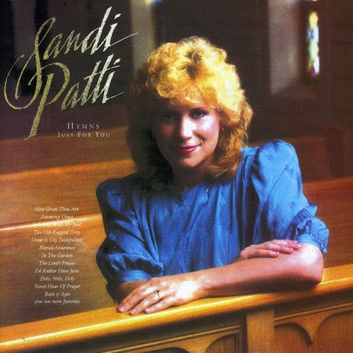 the album cover for Sandi Patty - Hymns Just for You