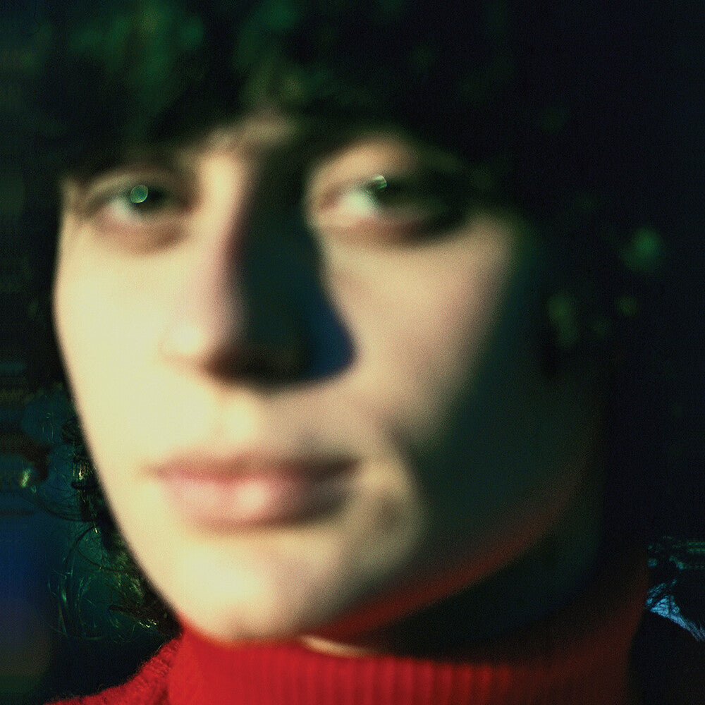 the album cover for Ana Frango Elétrico - Little Electric Chicken Heart (Blue) [Colored Vinyl]