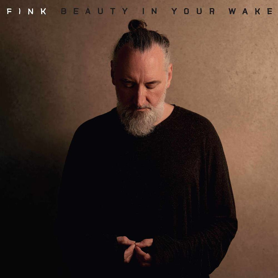 the album cover for Fink - Beauty In Your Wake (W/Book) (Blk)