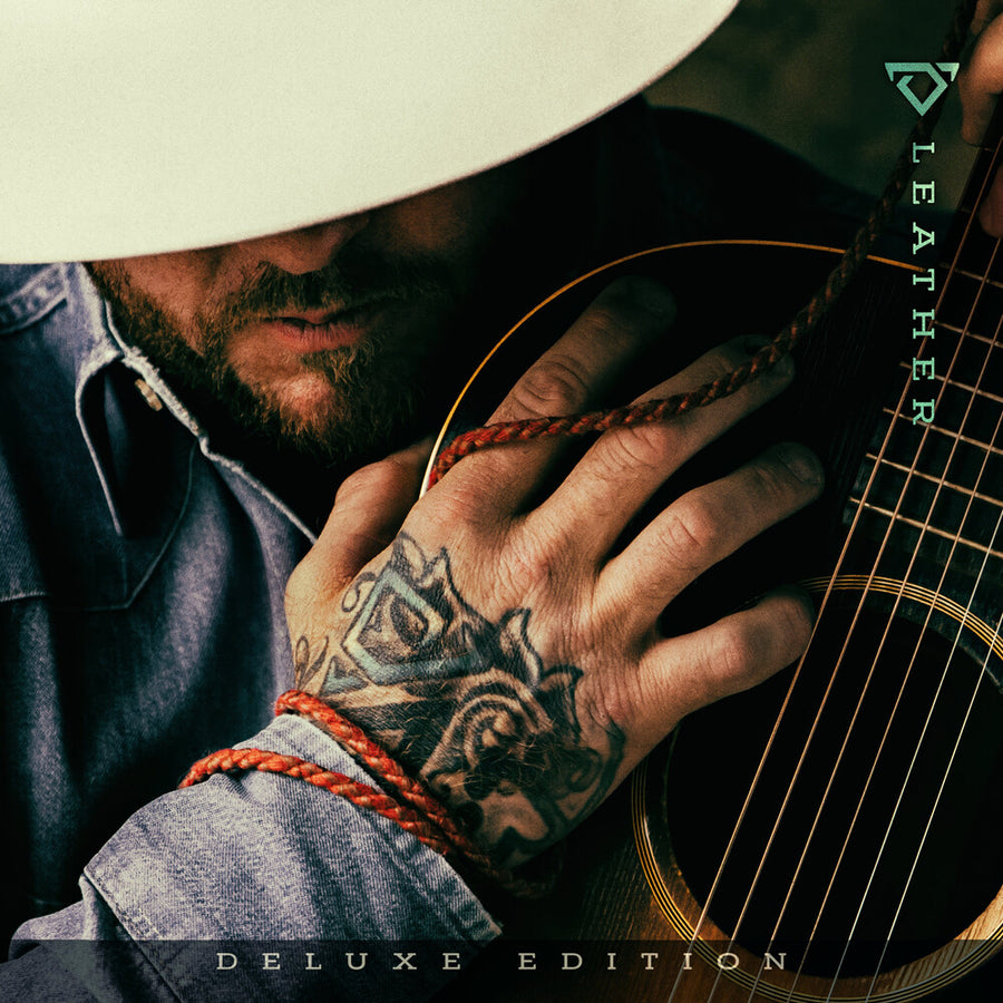 the album cover for Cody Johnson - Leather Deluxe Edition