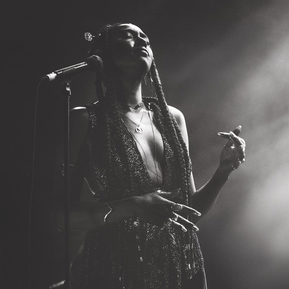 the album cover for Dominique Fils-Aimé - Live At The Montreal International Jazz Festival