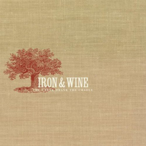 the album cover for Iron And Wine - The Creek Drank The Cradle