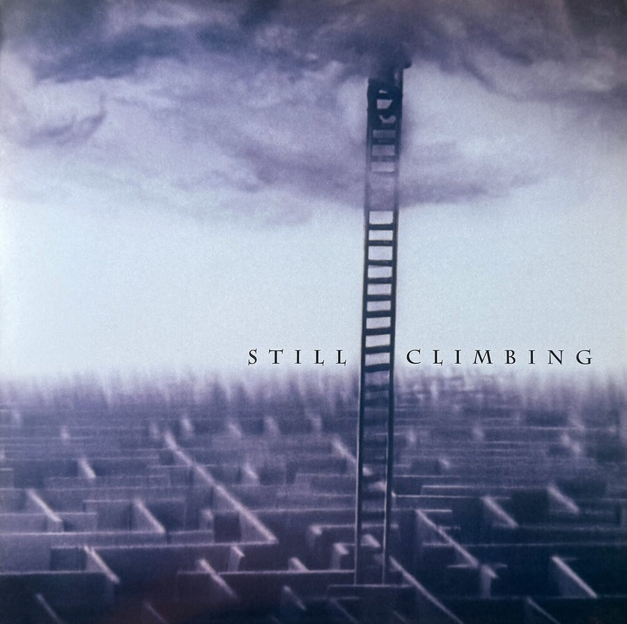 the album cover for Cinderella - Still Climbing (Uk)