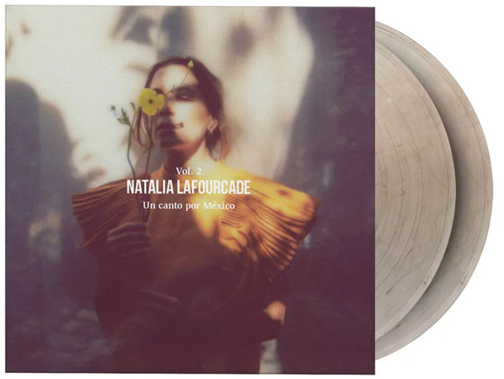 the album cover for Natalia Lafourcade - Un Canto Por Mexico Vol 2 [Crystal Clear and Black Marbled]