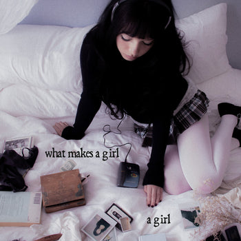 the album cover for Esha Tewari - What Makes A Girl A Girl