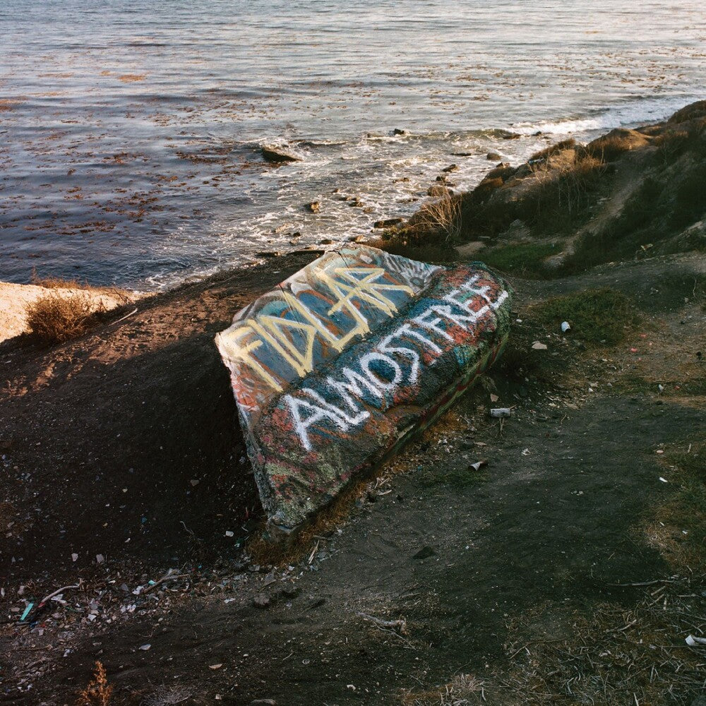 the album cover for FIDLAR - Almost Free [Frosted Yellow]