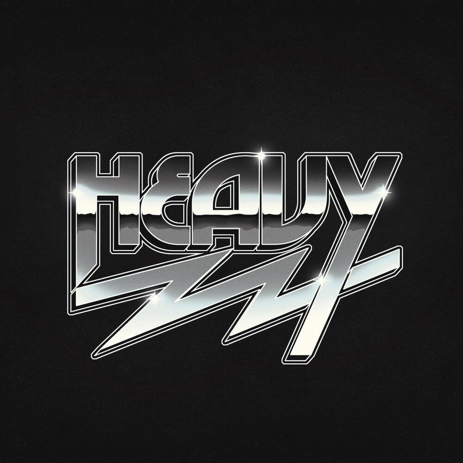 the album cover for The Howlers - Heavy