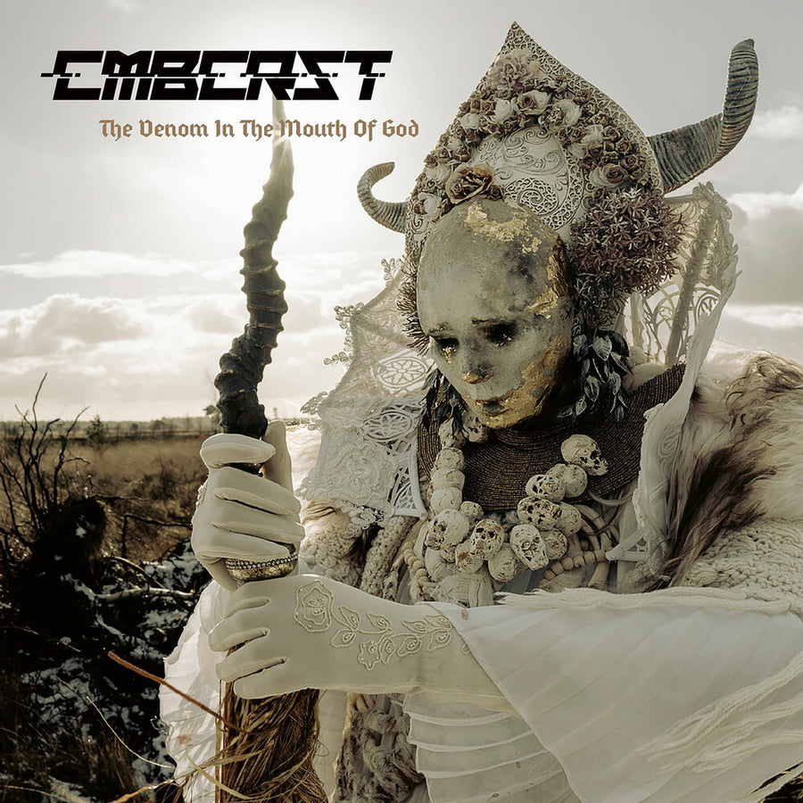 the album cover for Combichrist - The Venom in the Mouth of God