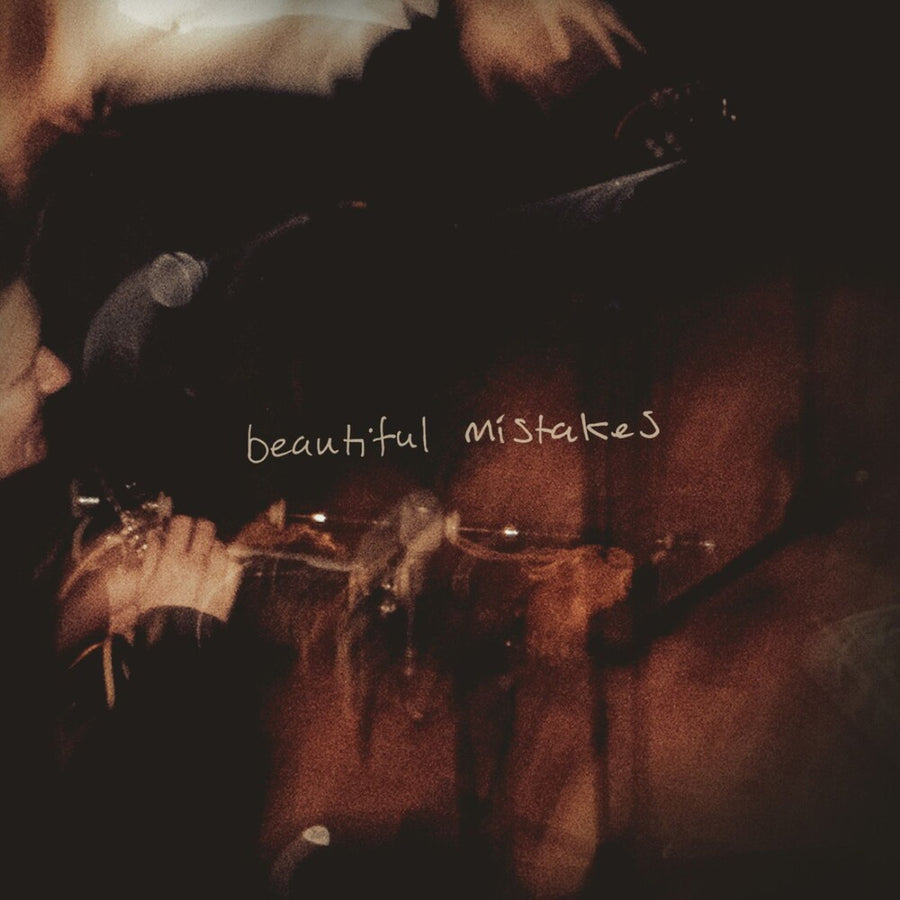 the album cover for Skerryvore - Beautiful Mistakes