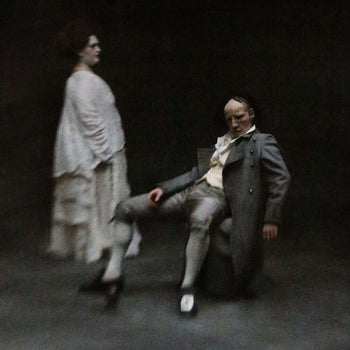 the album cover for HMLTD - FANGS [Indie Exclusive A & B Side Mix Black & Ivory]