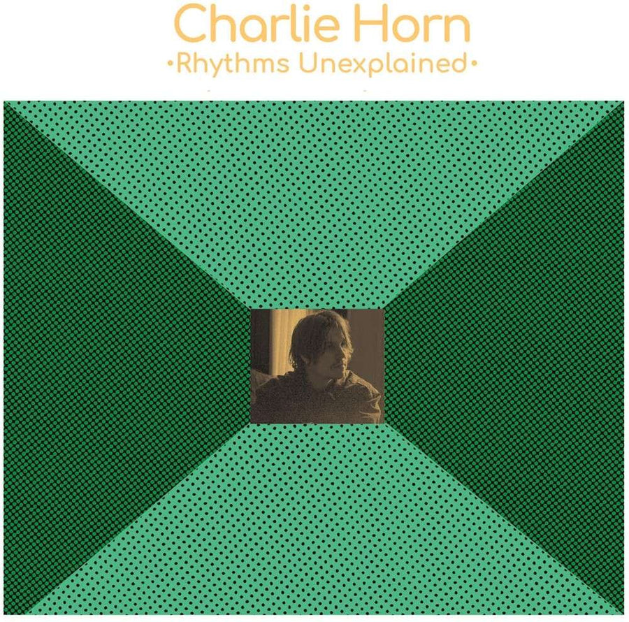 the album cover for Charlie Horn - Rhythms Unexplained