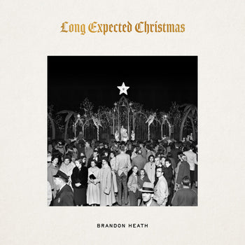 the album cover for Brandon Heath - Long Expected Christmas
