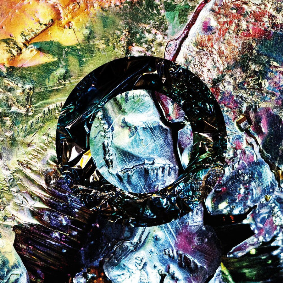 the album cover for Comet Is Coming - Exploding In Slow Motion: The Complete Channel The Spirits Recordings