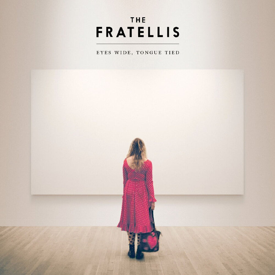 the album cover for Fratellis - Eyes Wide Tongue Tied - Red/White Sunburst [Colored Vinyl]