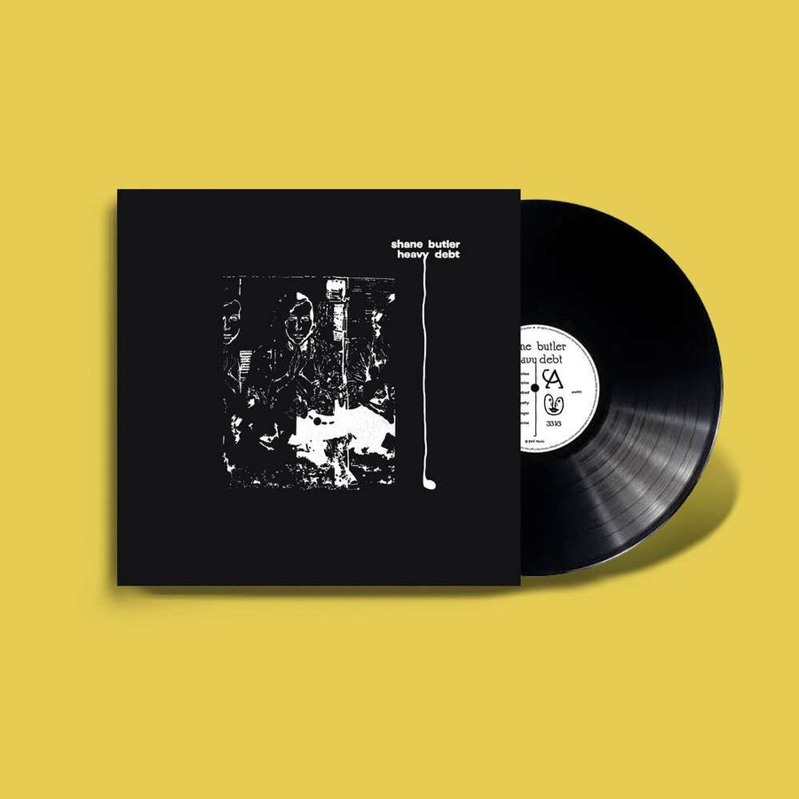 the album cover for Shane Butler - Heavy Debt