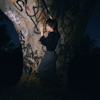 the album cover for Johanna Warren - Frog In The Belly Of A Snake