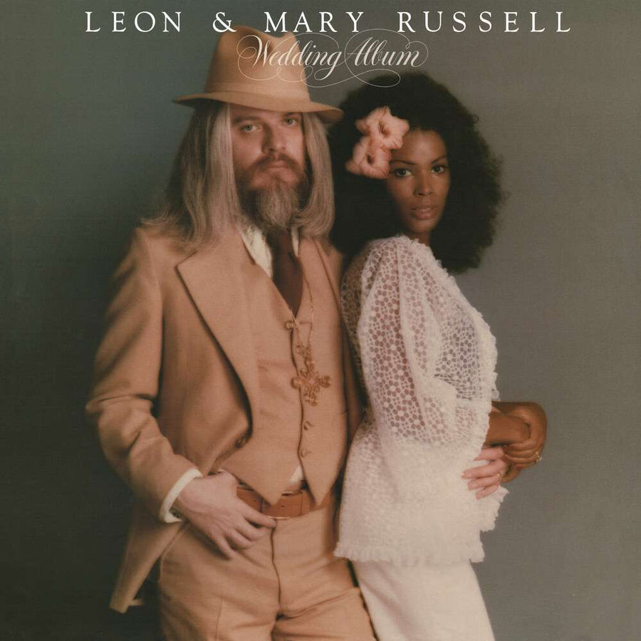 the album cover for Leon Russell - Wedding Album [Clear Vinyl] (Gol) (Aniv)