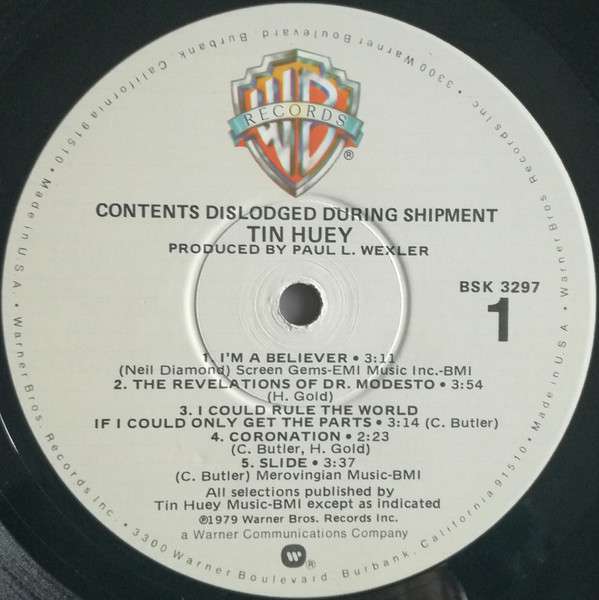 Contents Dislodged During Shipment - Huey, Tin