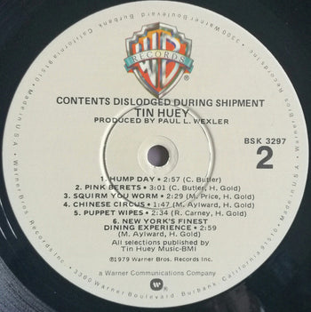 Contents Dislodged During Shipment - Huey, Tin