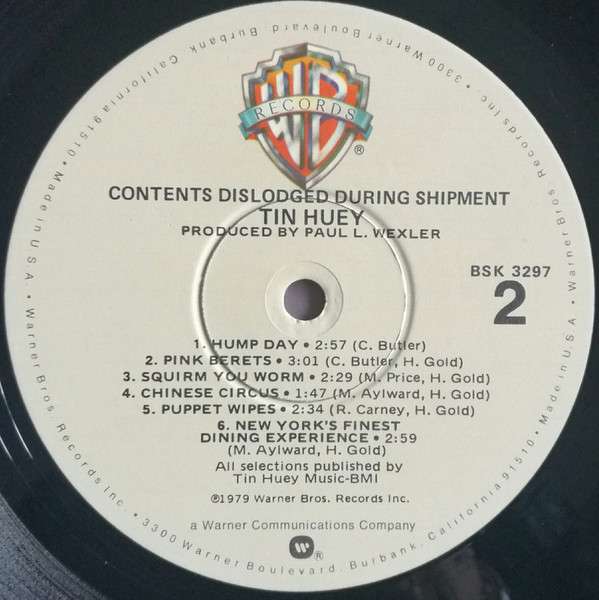 Contents Dislodged During Shipment - Huey, Tin