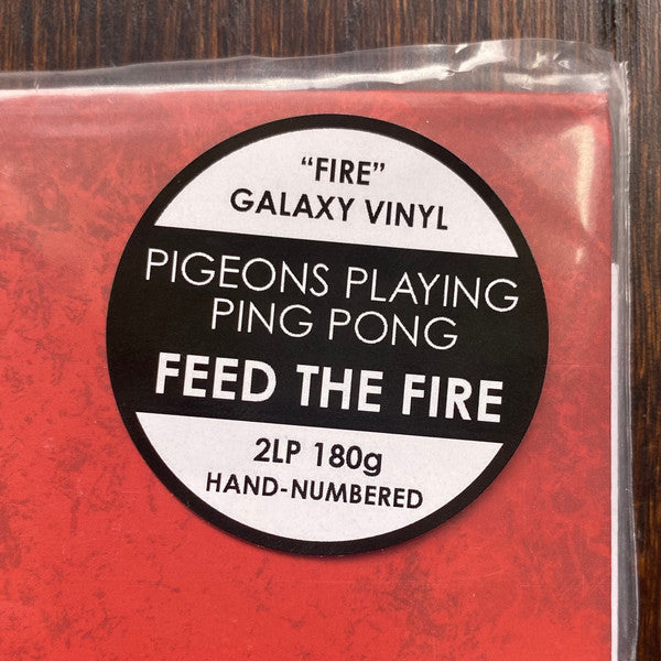 Feed the Fire - Pigeons Playing Ping Pong
